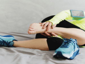 A caring pediatric orthopedist examining a child with a joint sprain at POBAR clinic in Brandon.