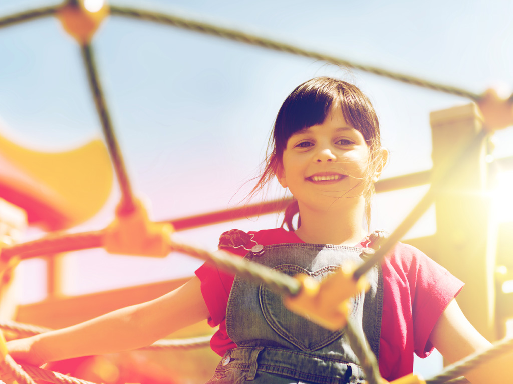 Parent supporting a child after a sports injury, illustrating ligament injuries in kids and the need for gentle care in Brandon.